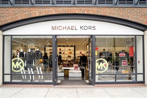 who owns Michael Kors brand